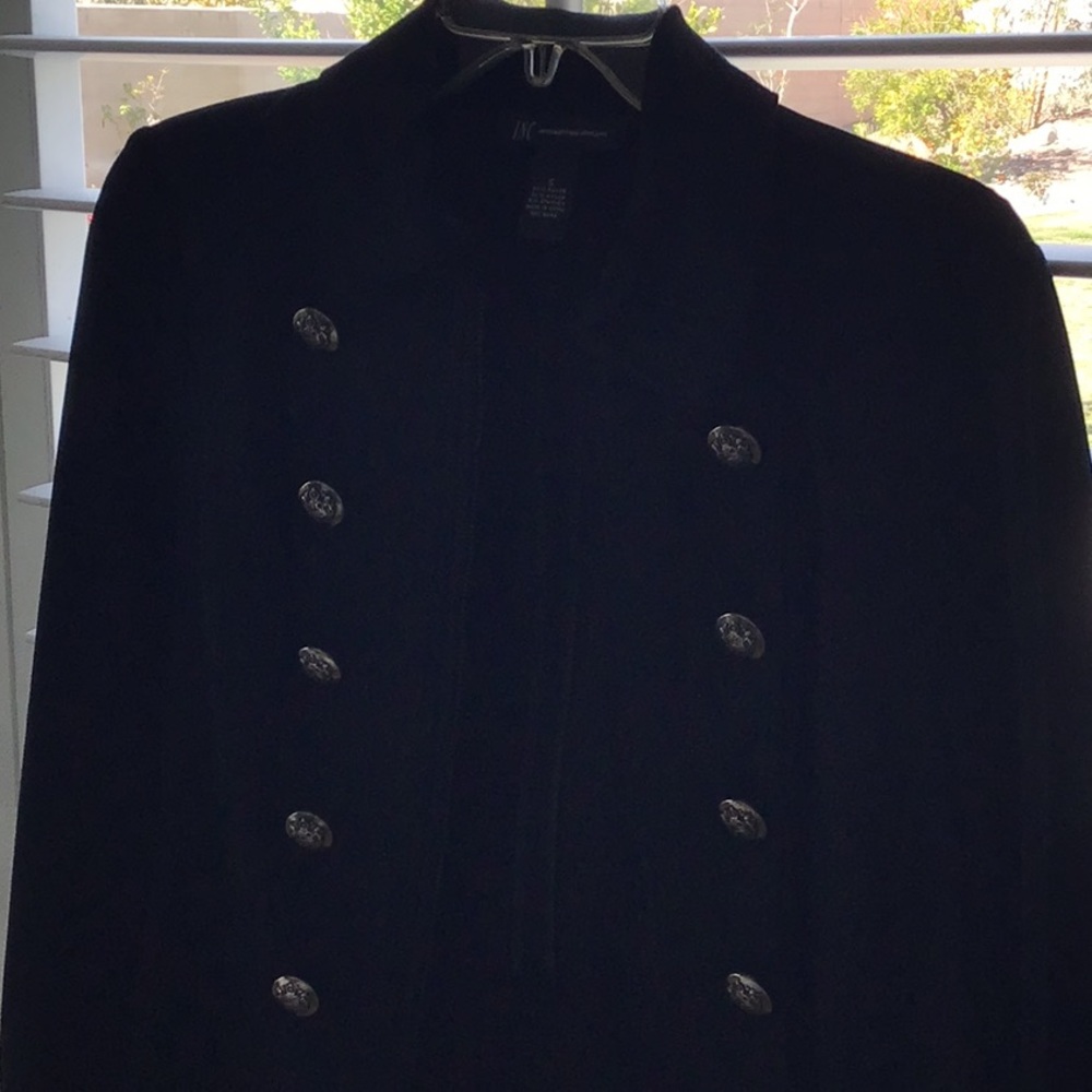 Black jacket with silver embossed buttons on each side.